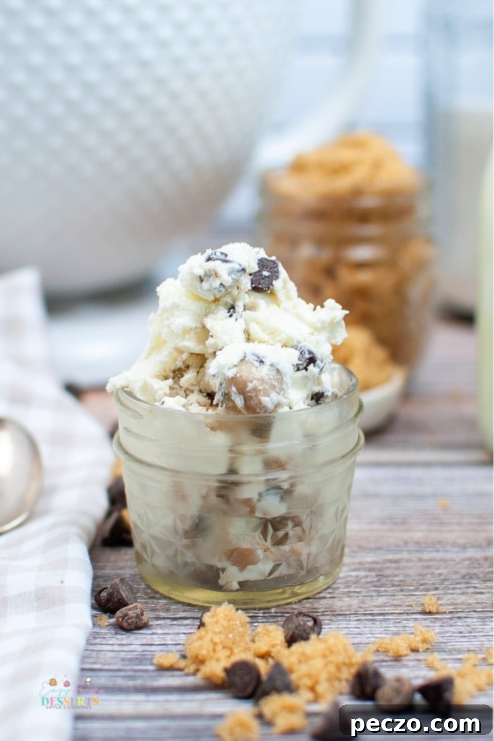 Homemade cookie dough ice cream in a jar, topped with extra cookie dough bits