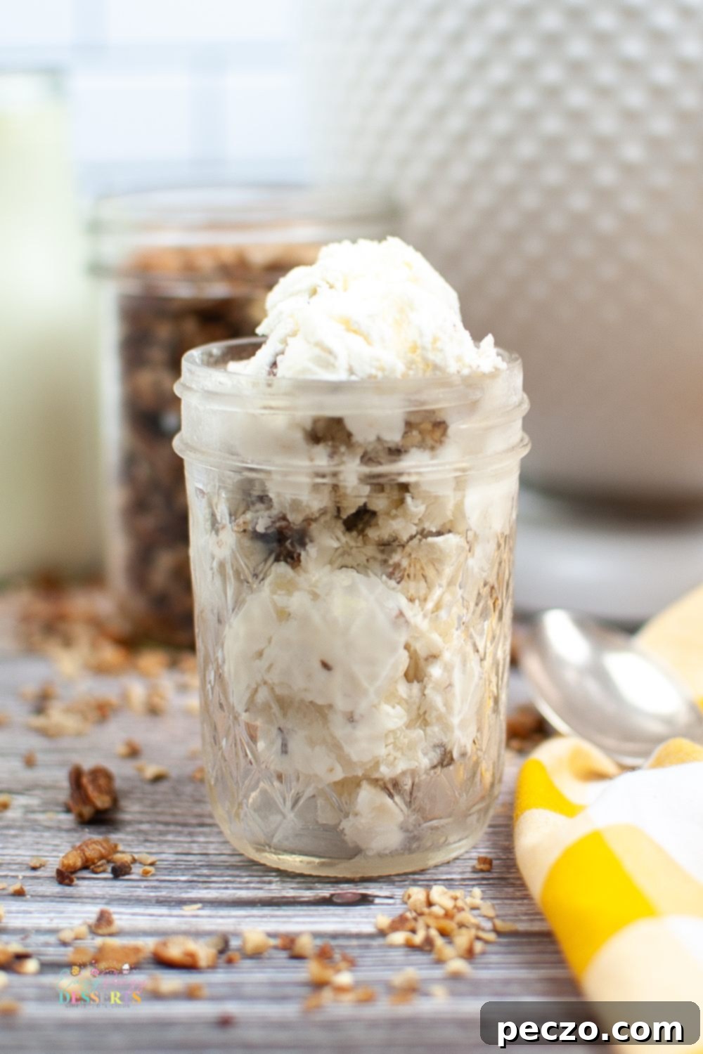 Front image of a jar filled with butter pecan ice cream