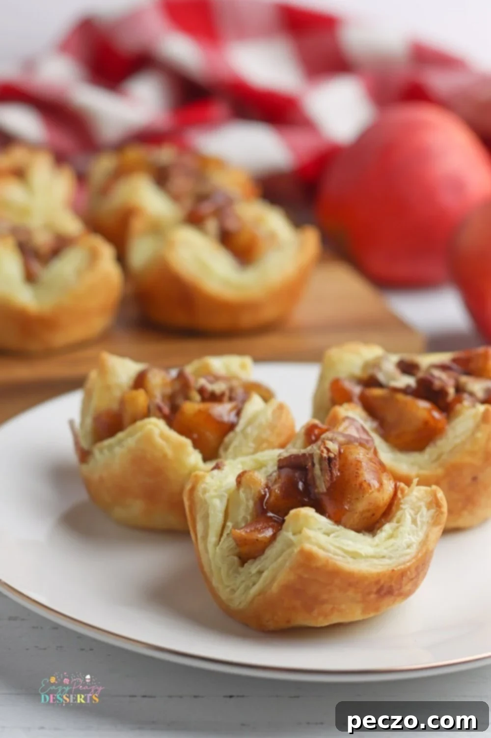 Apple pie cups with a golden puff pastry crust