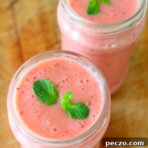 Over head image of protein fruit smoothie in a jar