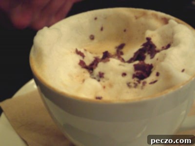 Delicious Cappuccino and breakfast spread