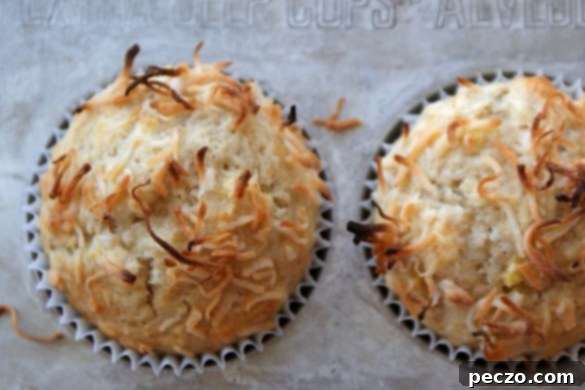 Fresh coconut with straws for drinking, capturing a moment of tropical-inspired fun.