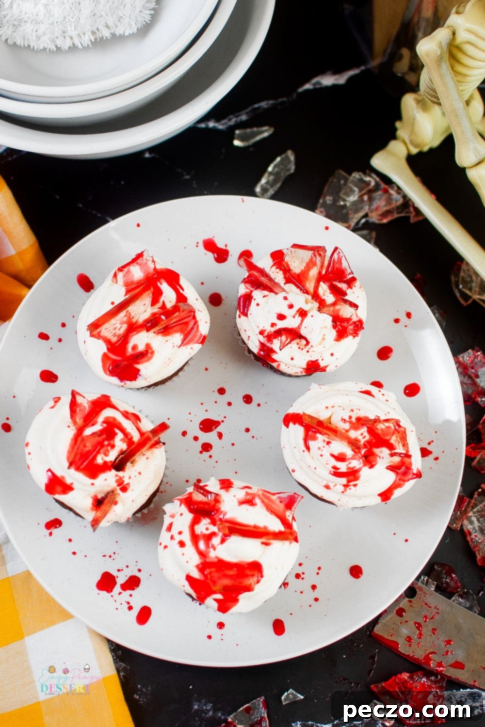 Over head image of Halloween cupcakes with sugar glass shards, showing the full spread of the dessert.