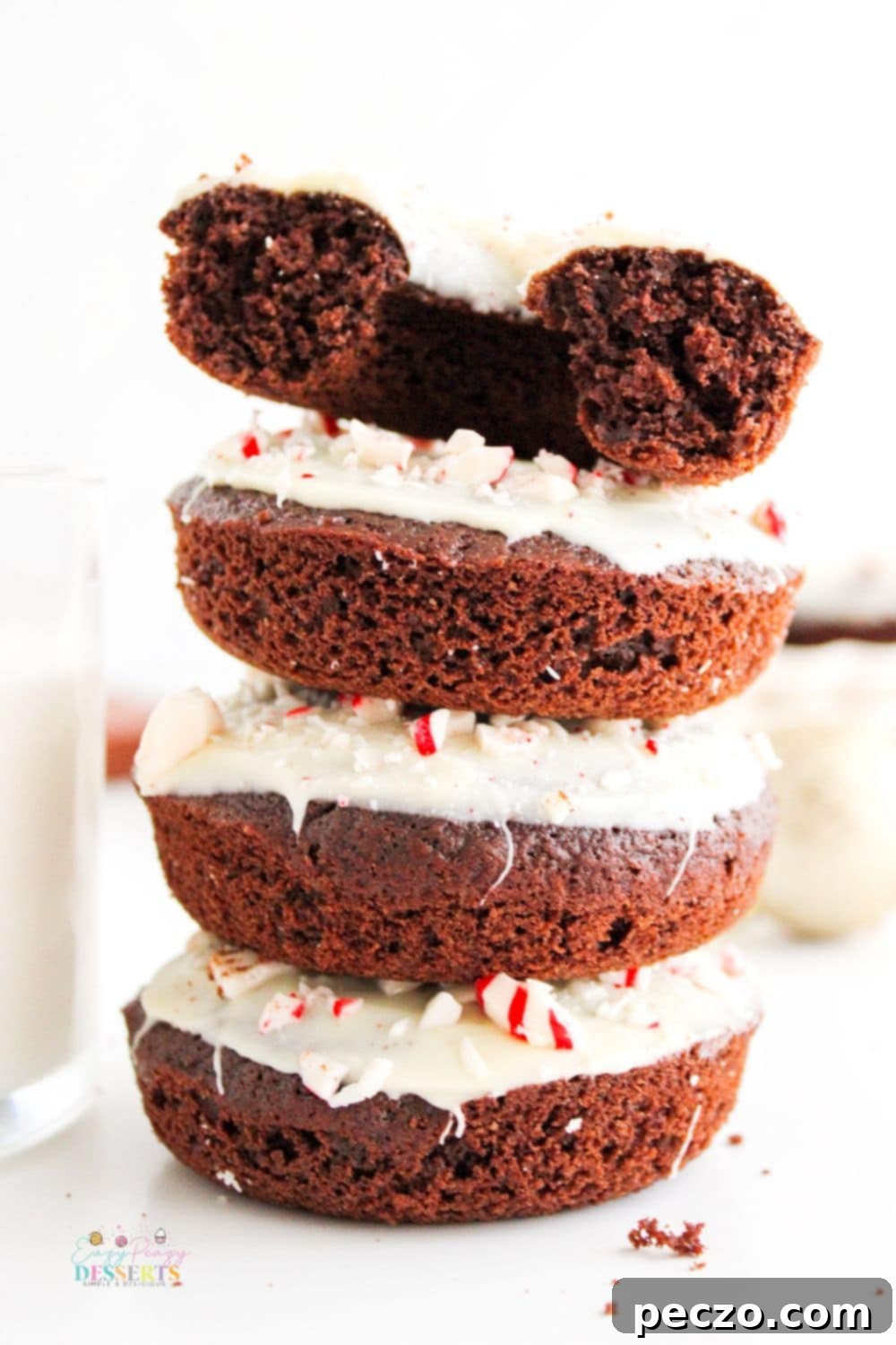 A stack of four Peppermint donuts