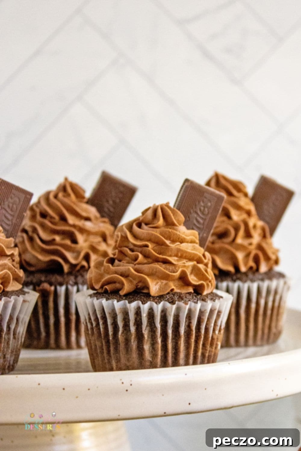 Peppermint chocolate cupcakes with green food coloring in the frosting.