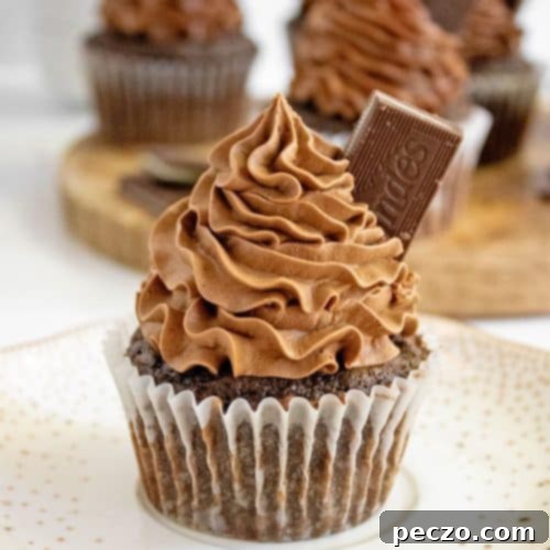 Peppermint cupcakes with green and white frosting.