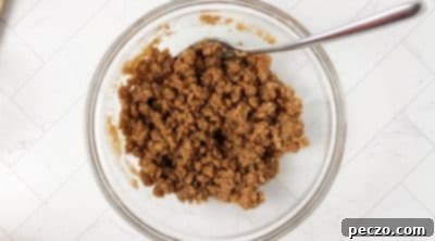 Mixing streusel topping for gingerbread muffins