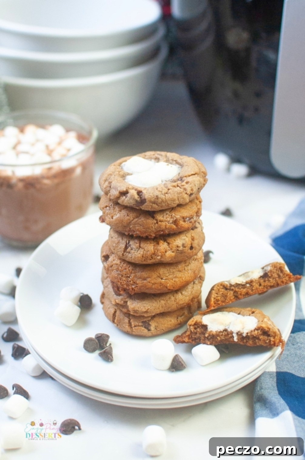 Festive Christmas cocoa cookies with chocolate chips and melted marshmallows