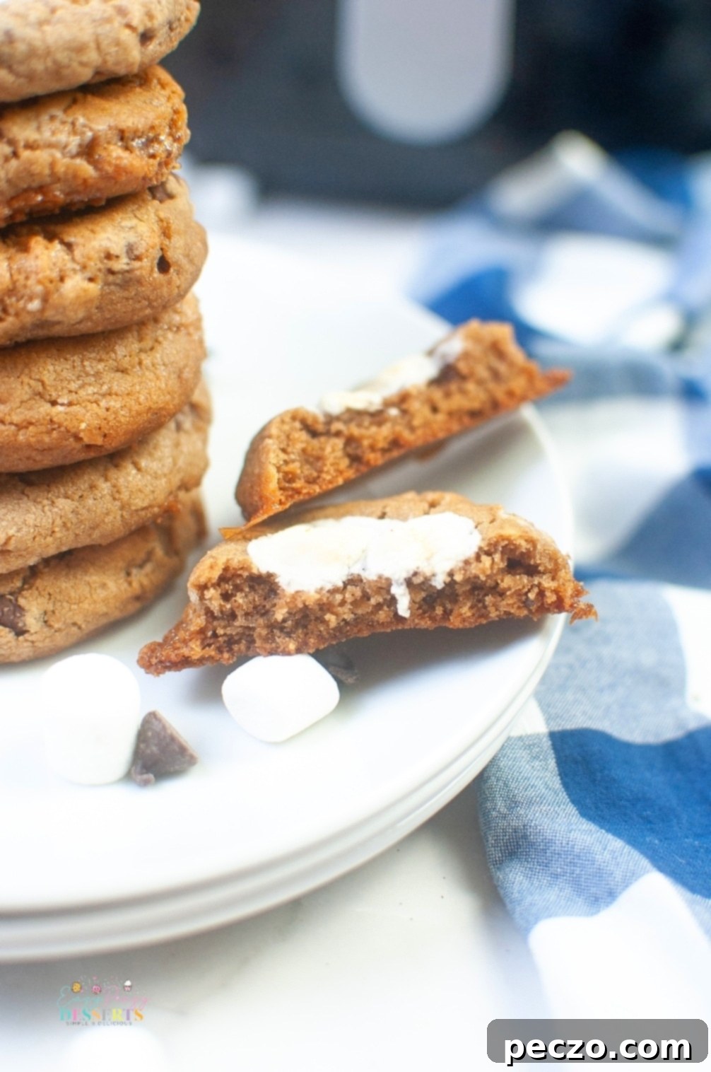 Hot cocoa cookie dough and baked cookies on a cooling rack