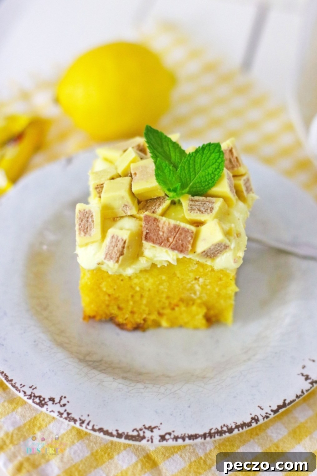 A slice of slow cooker lemon cake with a crunchy topping, ready to serve.