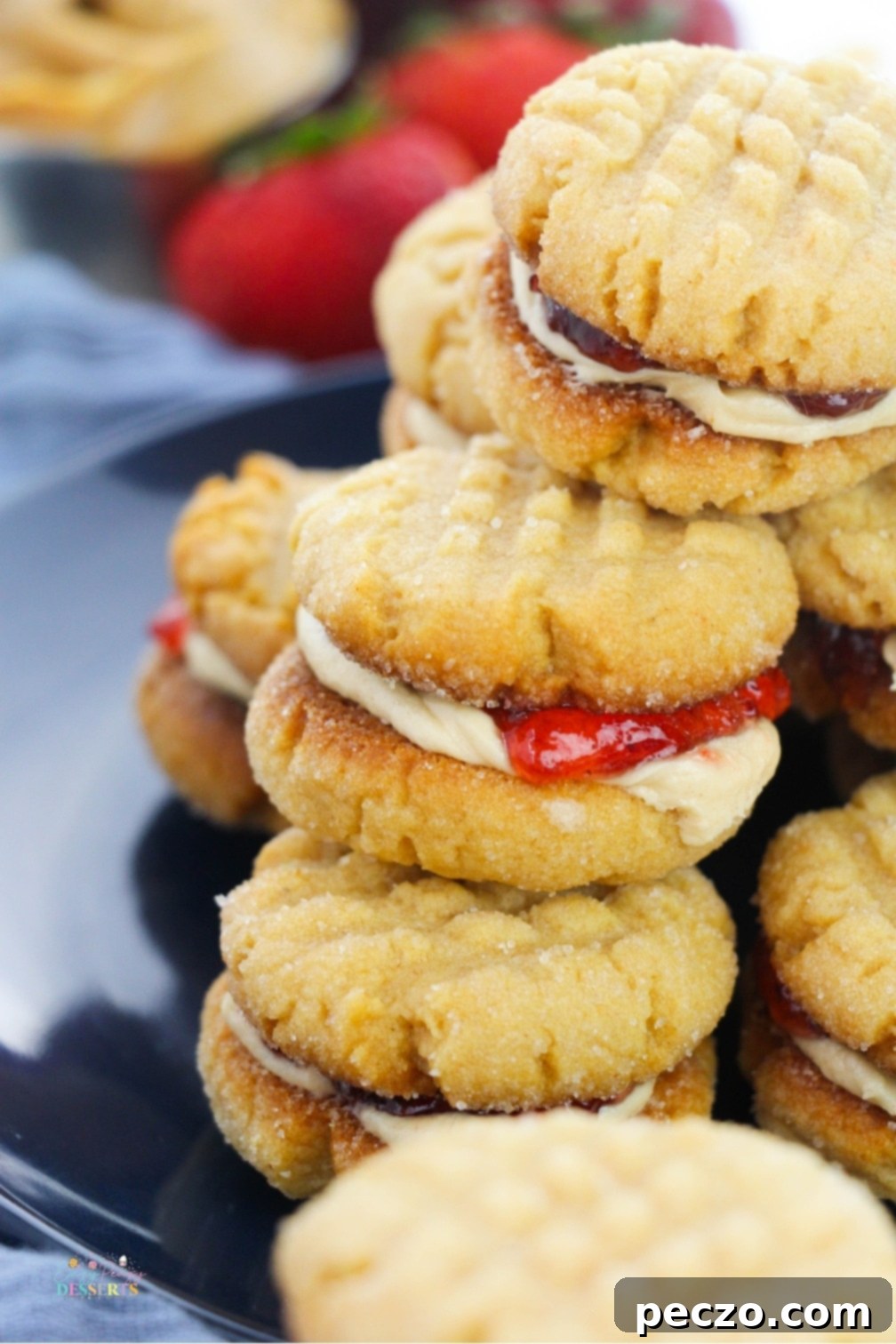 A stack of homemade Peanut Butter and Jelly Sandwich Cookies