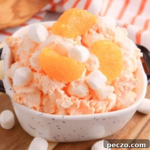 Classic orange fluff salad, perfect for any gathering