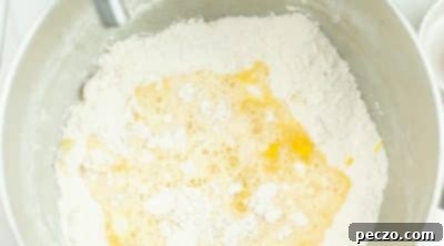 Adding wet ingredients to muffin batter
