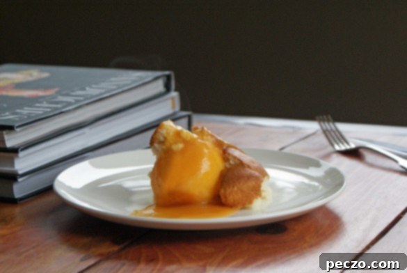 Close-up of Pierre's peach cake, showing tender peaches and golden cake