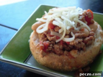 Hearty Turkey Barley Chili served in an edible bowl