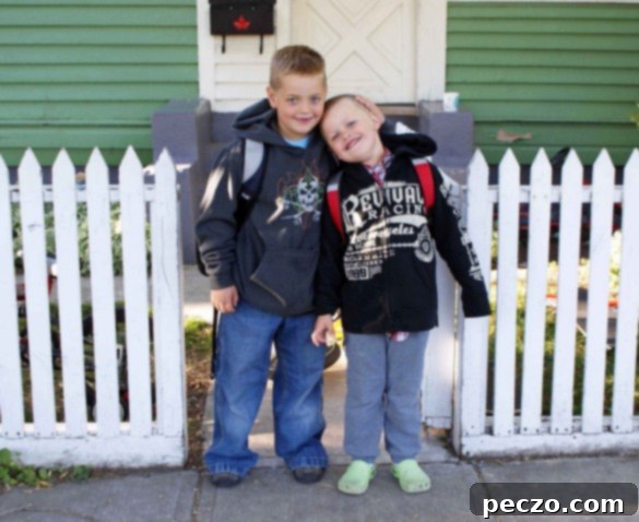 A child's hand holding a parent's hand on the first day of school, symbolizing a new beginning.