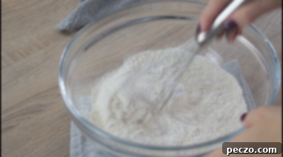 Mixing dry ingredients for honey cake